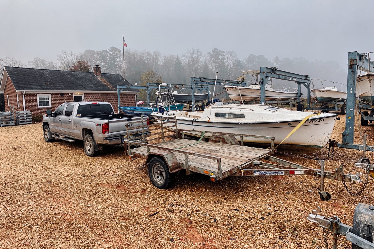 Boat disposal Atlanta boatyard sailboat removal on cradle dry storage