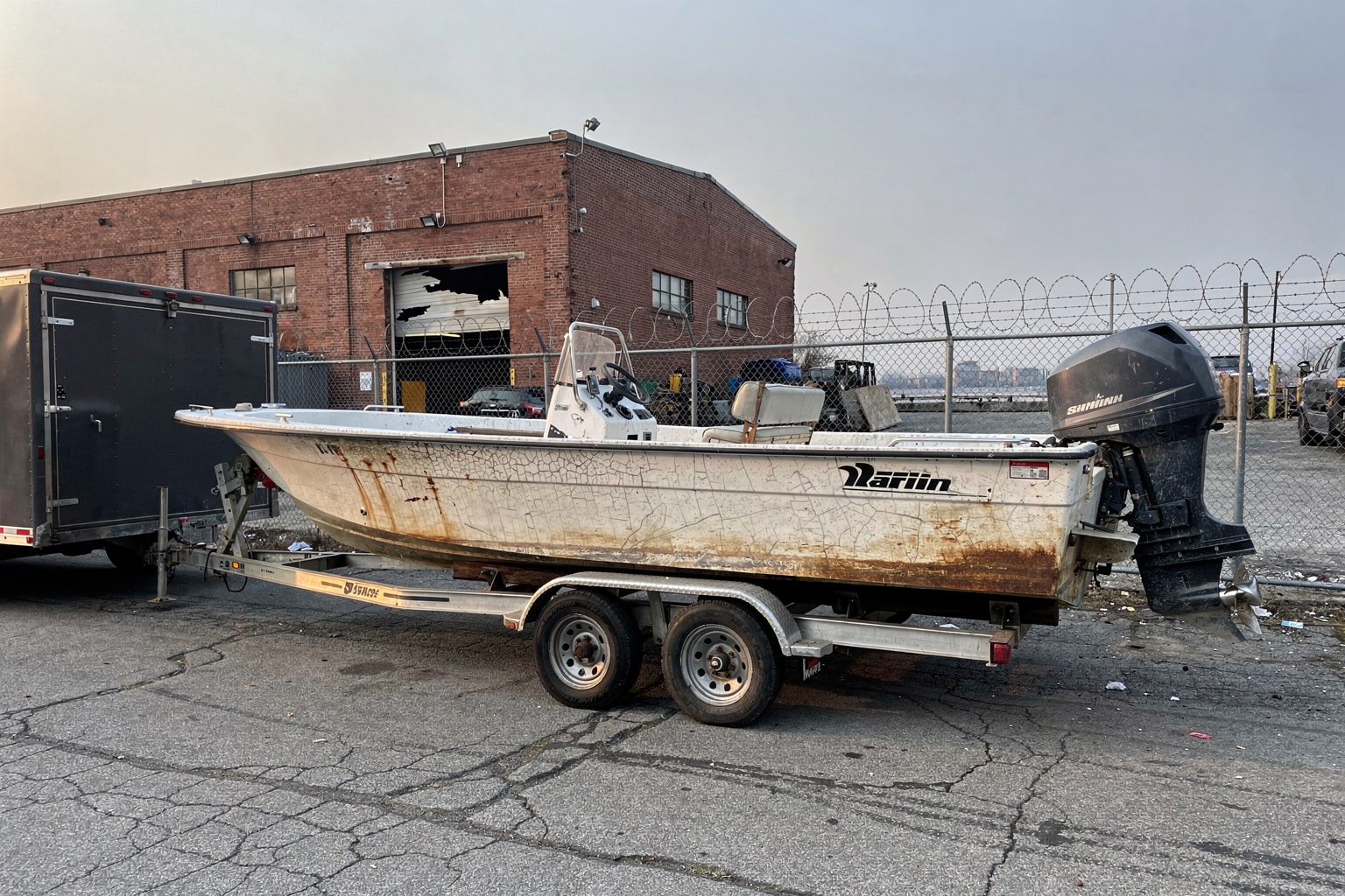 Boat disposal Bronx commercial lot, center console powerboat removal from industrial waterfront