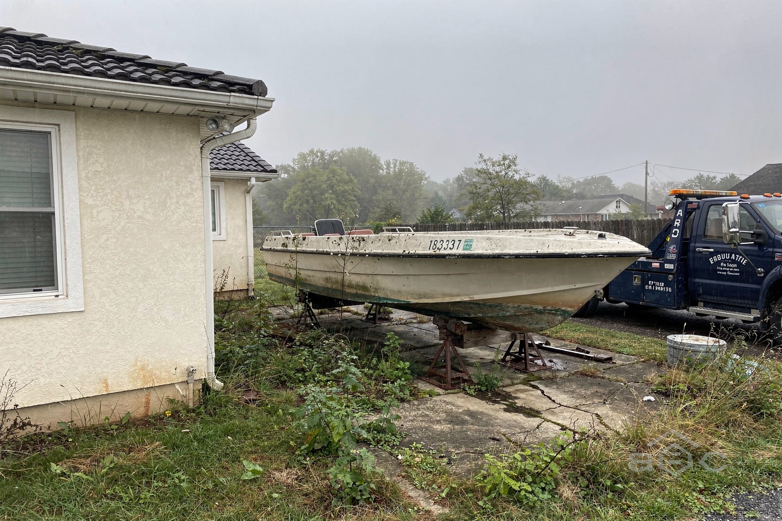 Boat disposal Nashville Tennessee junk boat on blocks ready for removal