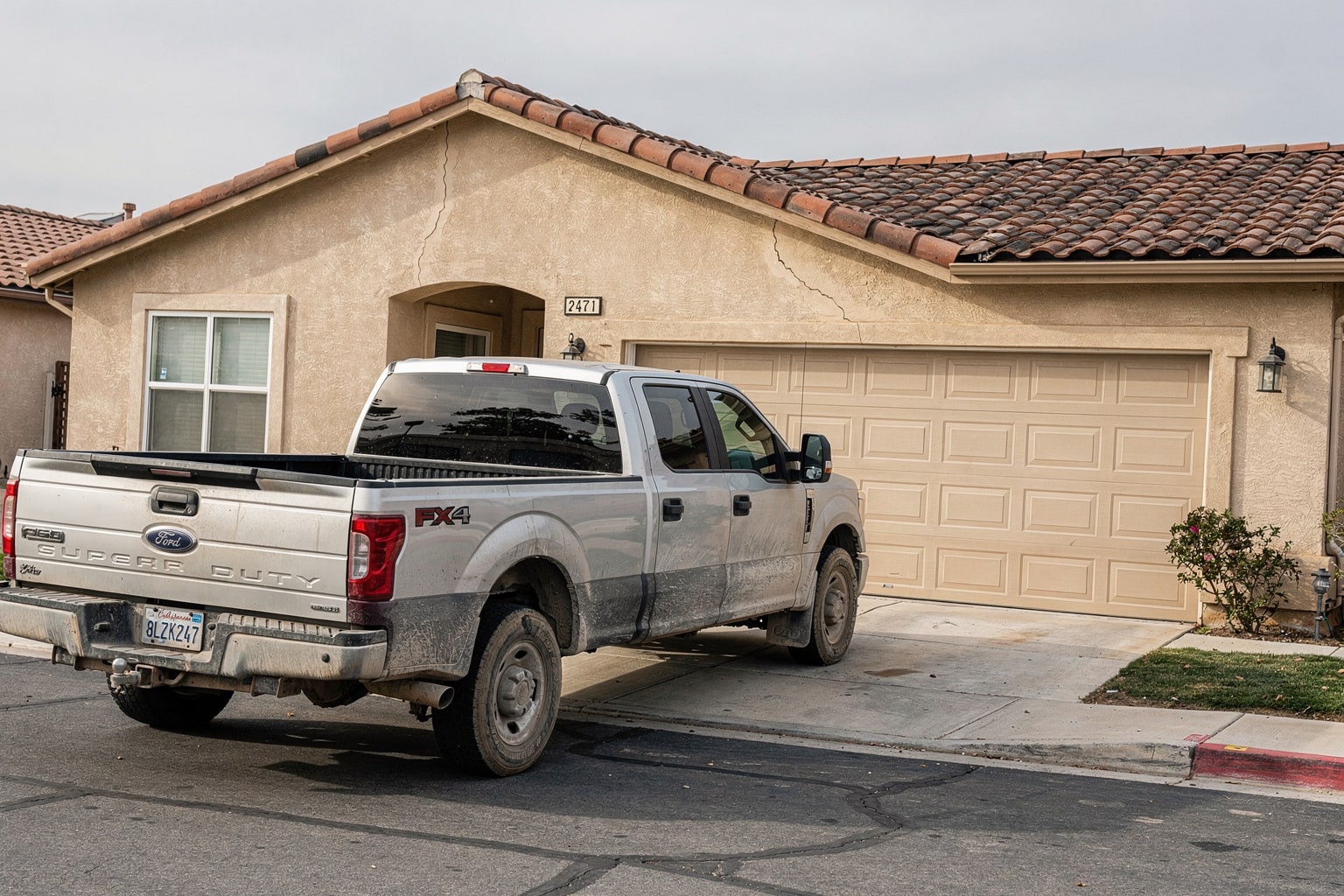 Junk boat removal in Los Angeles with old fishing boat loaded on trailer behind pickup truck
