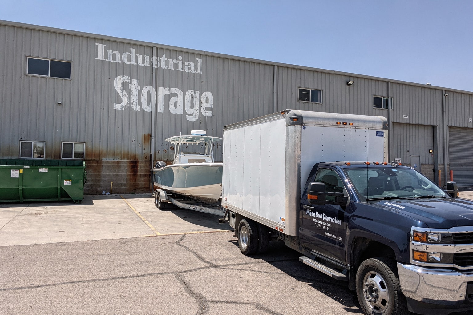 Junk boat removal Mesa Arizona commercial disposal loading dock truck