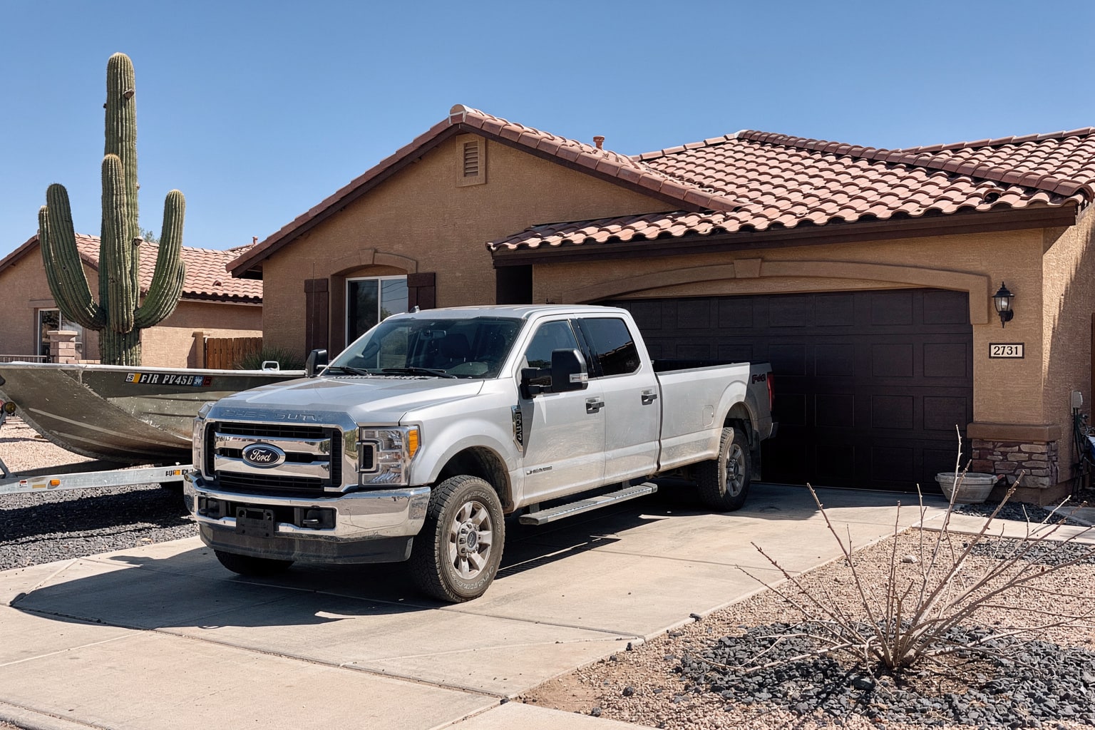 Junk boat removal Mesa Arizona pickup truck trailer old aluminum fishing boat disposal