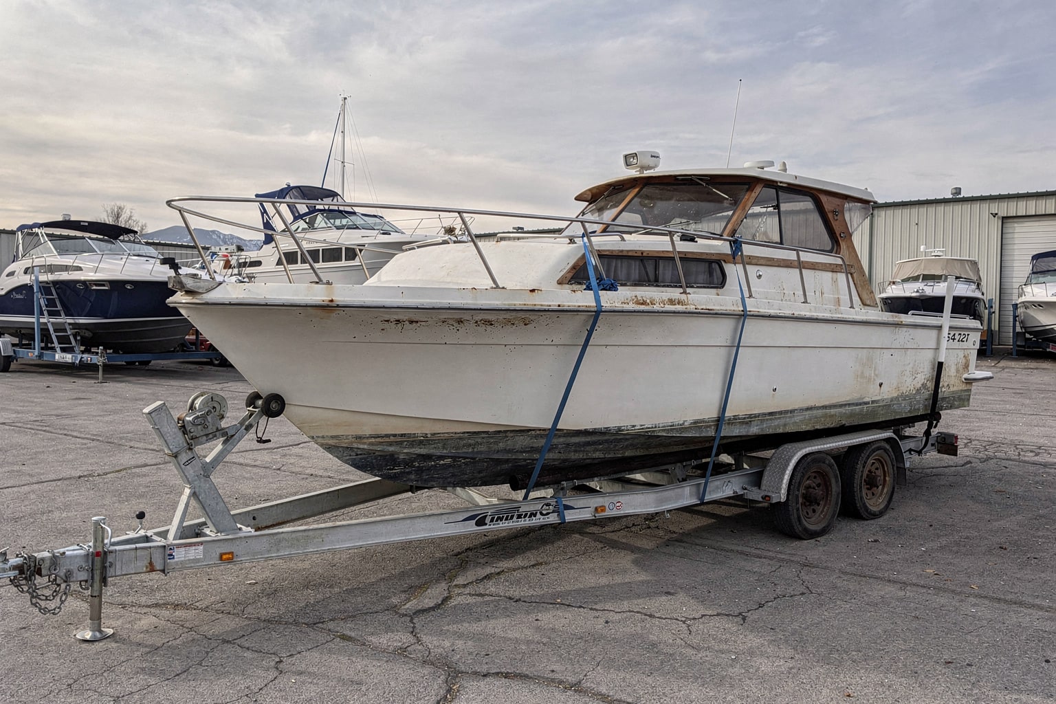Non-functional cabin cruiser boat storage and removal Utah commercial facility