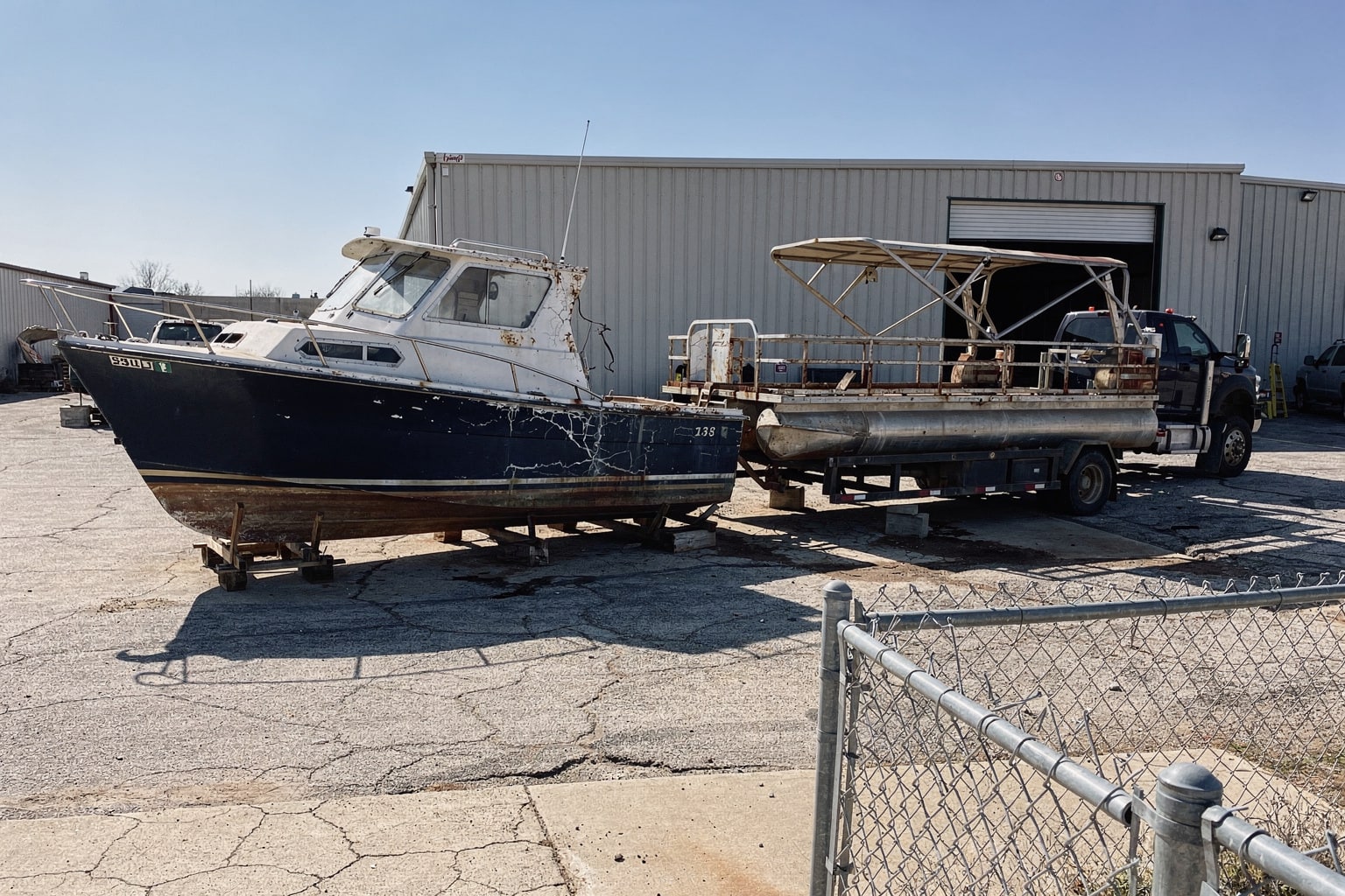Boat removal Oklahoma City junk boat disposal commercial lot storage