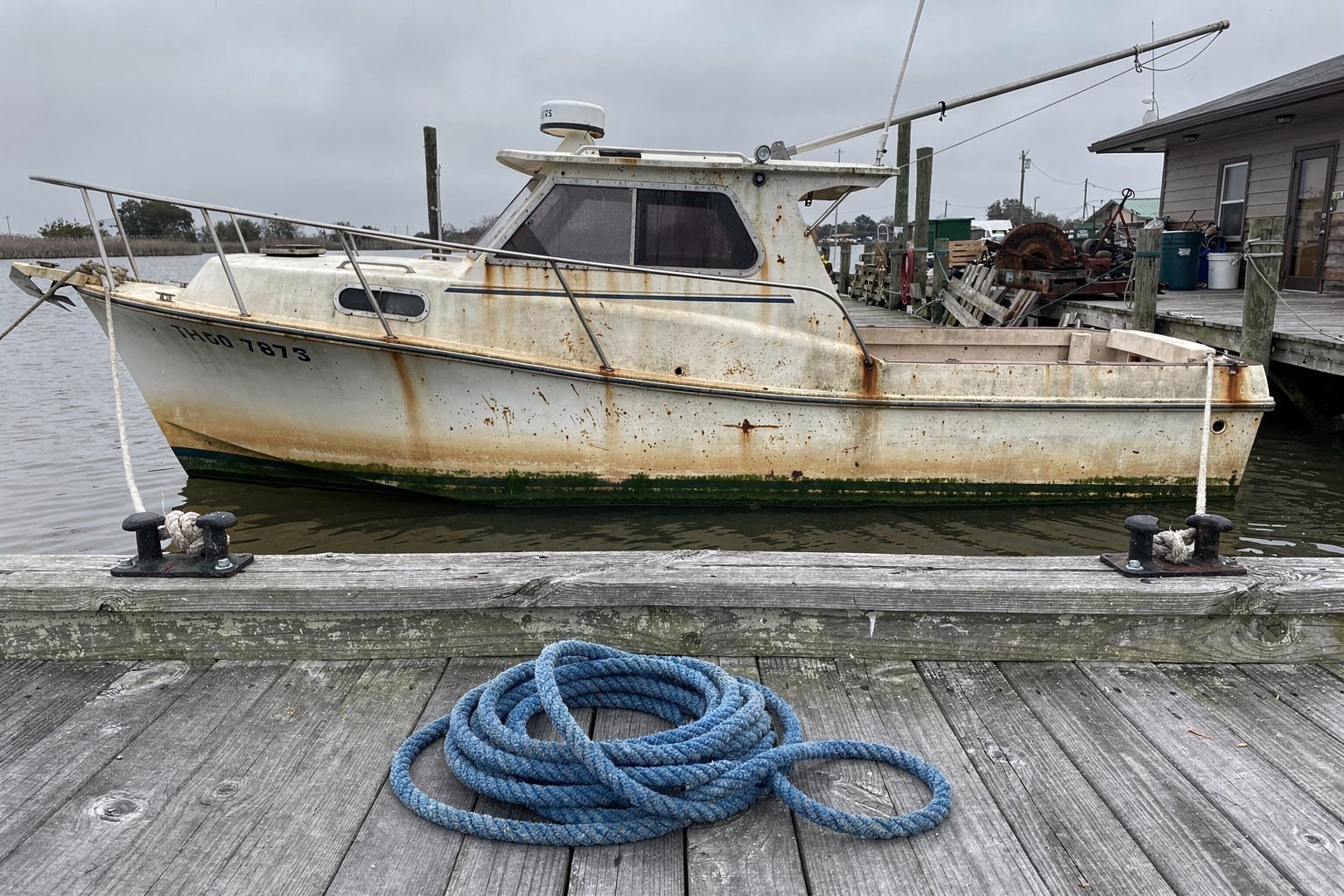 Marine salvage boat removal Texas marina dockside junk boat disposal
