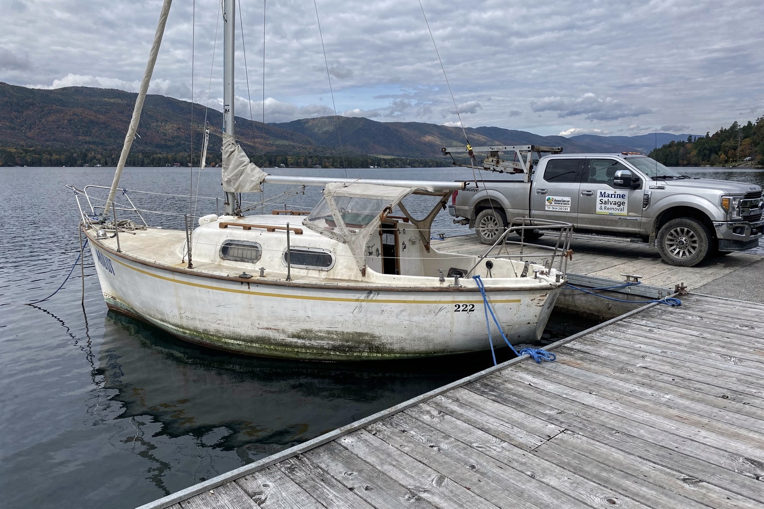 22-foot sailboat marine salvage removal at Vermont lakeside dock