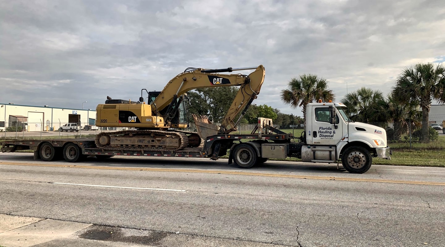 Heavy equipment towing service